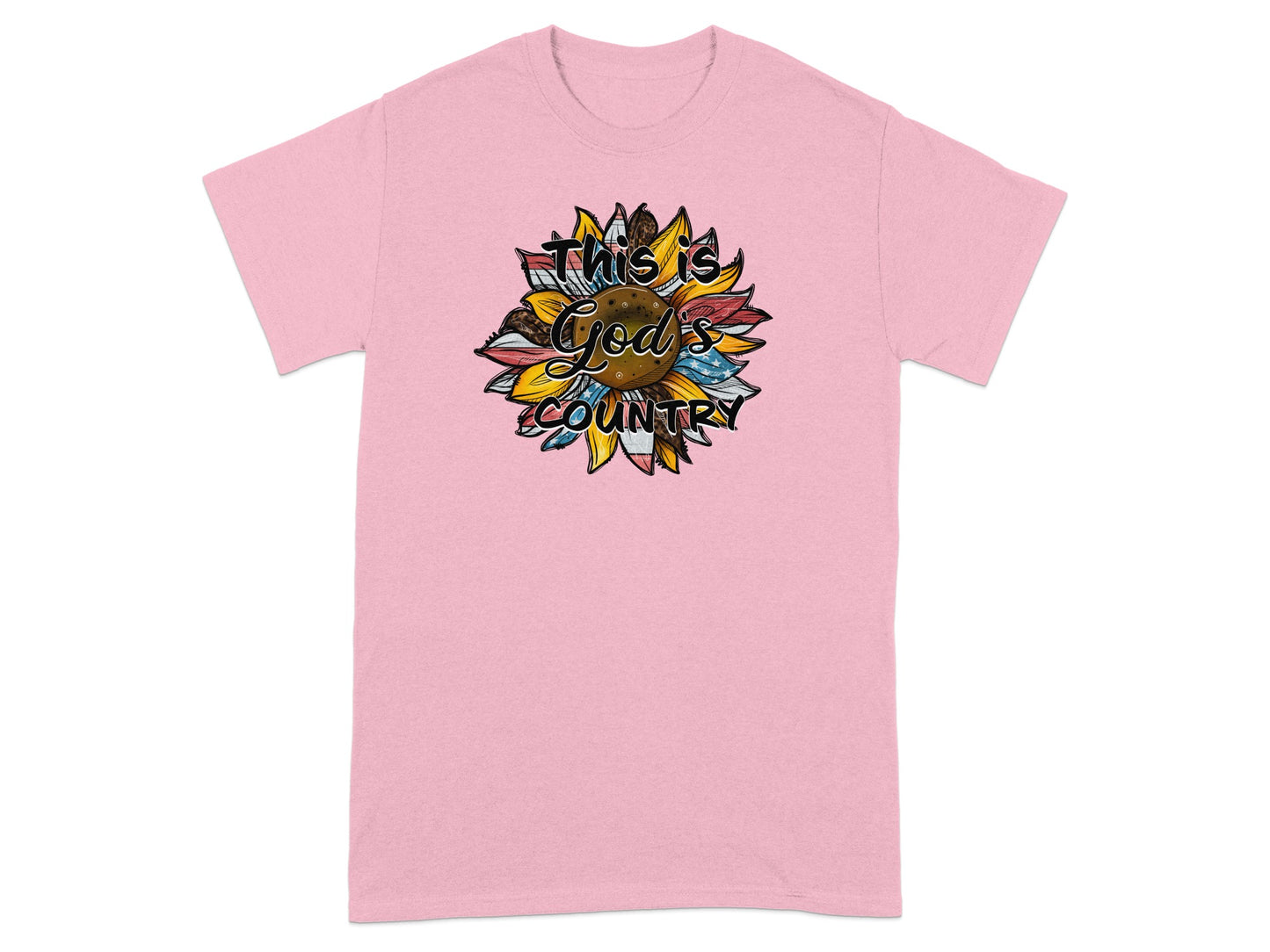 Pink t-shirt with sunflower graphic saying "This is God's Country".