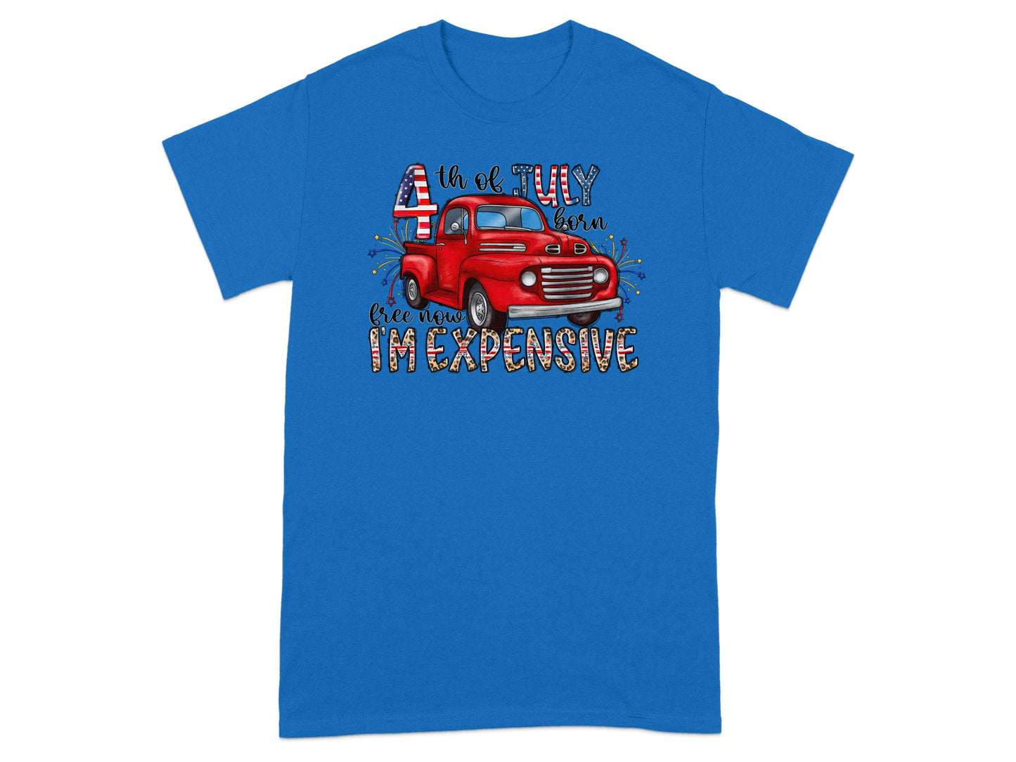 Blue t-shirt with red truck, fireworks, and text "4th of JULY born free now I'M EXPENSIVE".