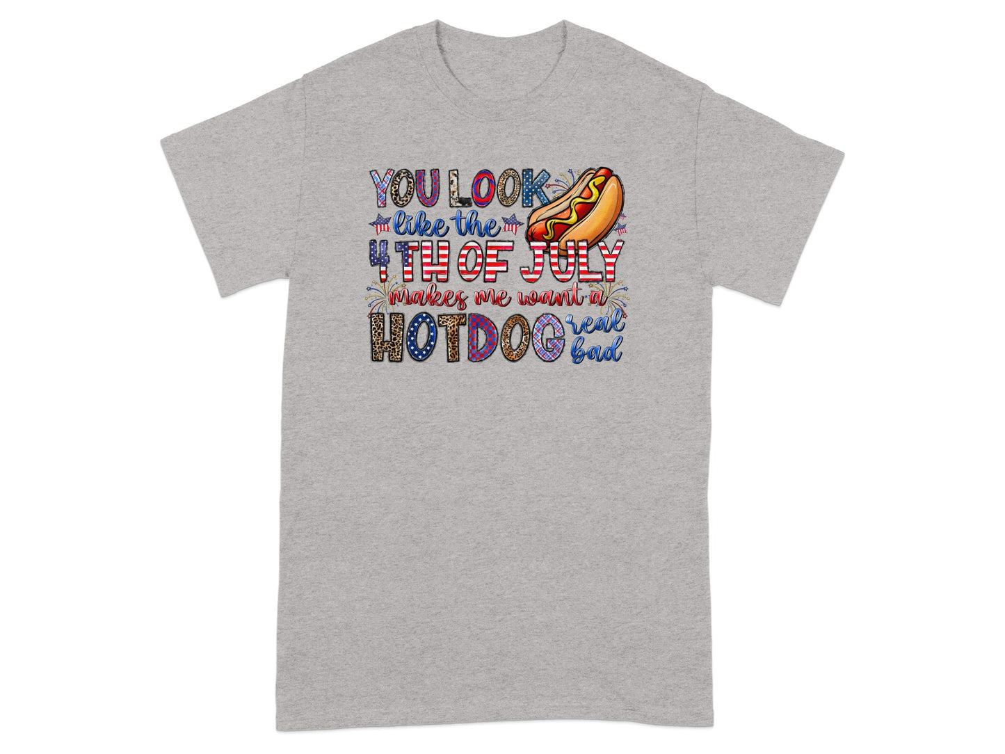 Grey t-shirt with text "YOU LOOK like the 4TH OF JULY makes me want a HOTDOG real bad" and a hotdog graphic.