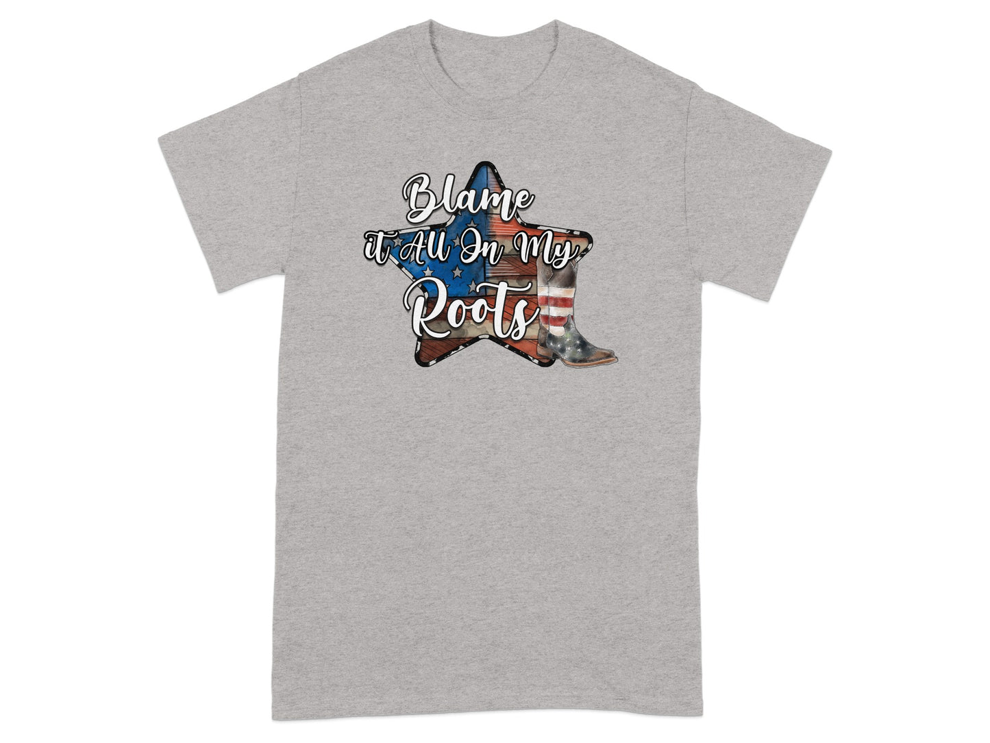 Grey t-shirt with a distressed star graphic featuring "Blame it All On My Roots" and a cowboy boot.