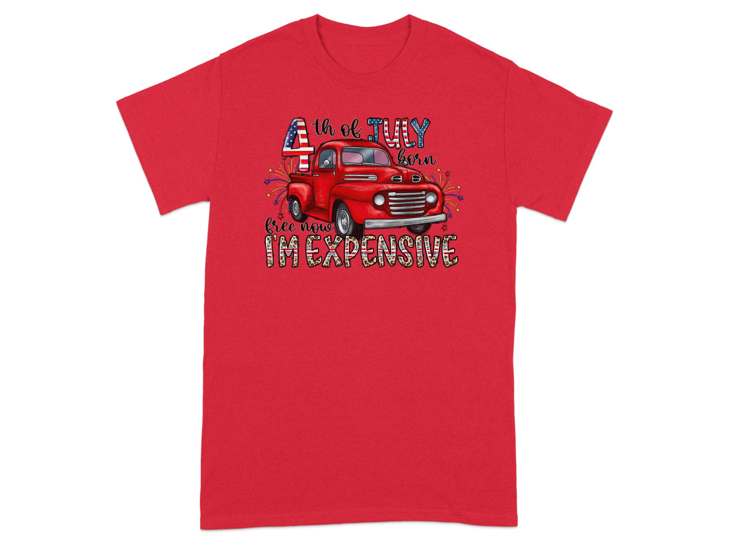 Red t-shirt with graphic of a red truck, fireworks, and text "4th of July born free now I'M EXPENSIVE".