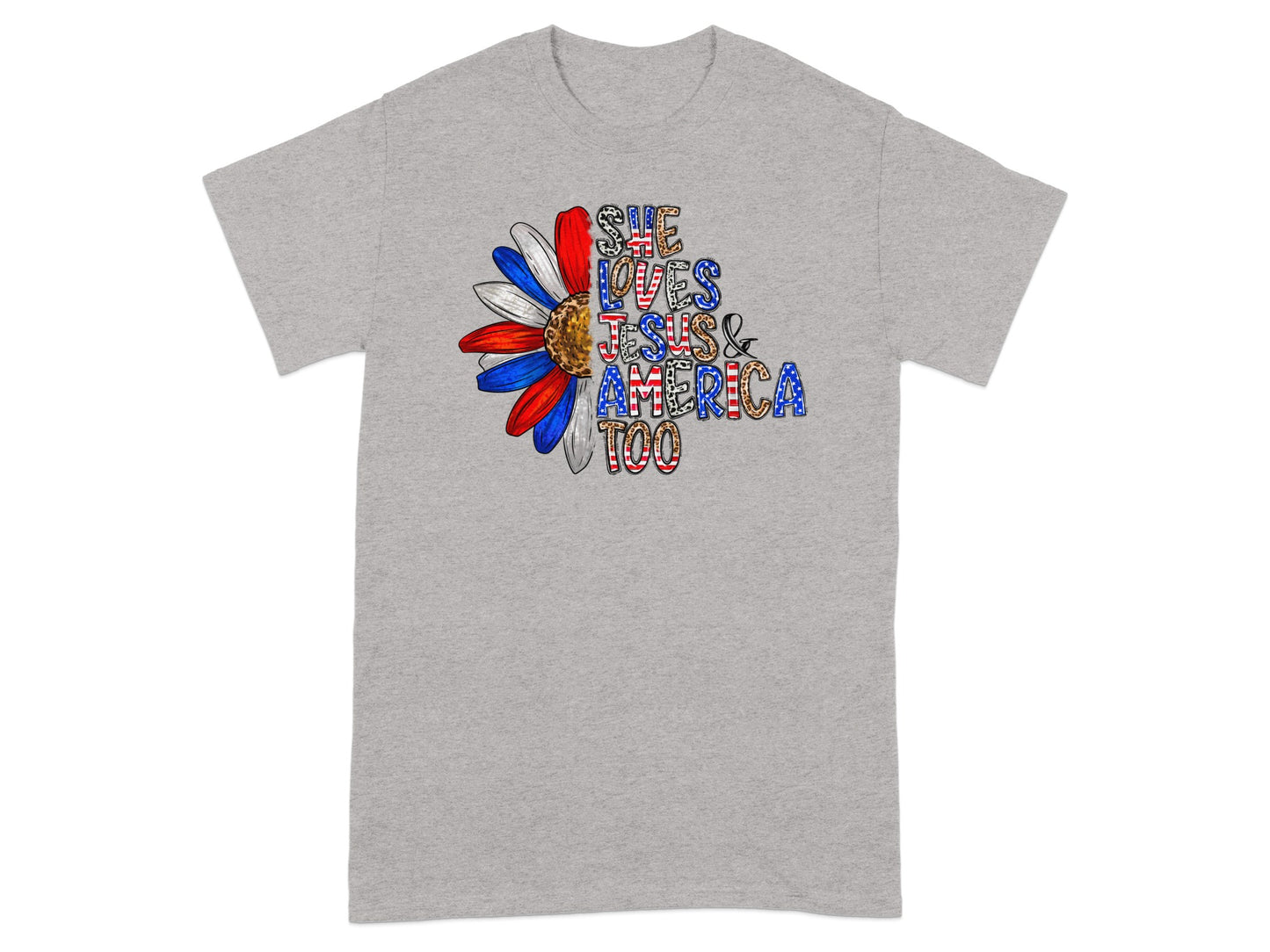 Grey t-shirt with patriotic flower graphic and "She Loves Jesus & America Too" text.